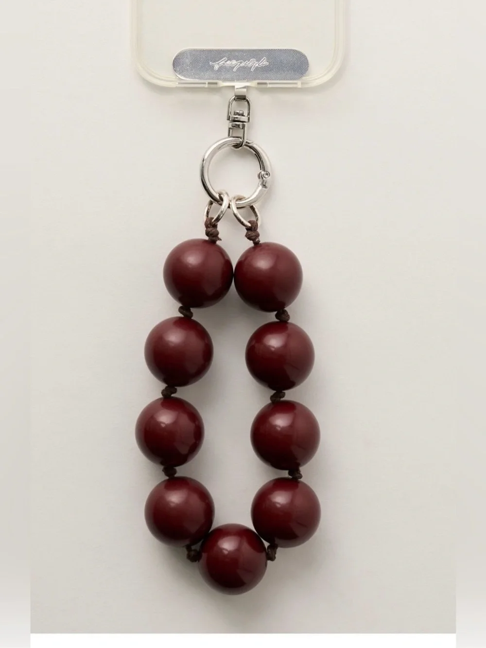 Free People Burgundy Beaded bauble phone wristlet
